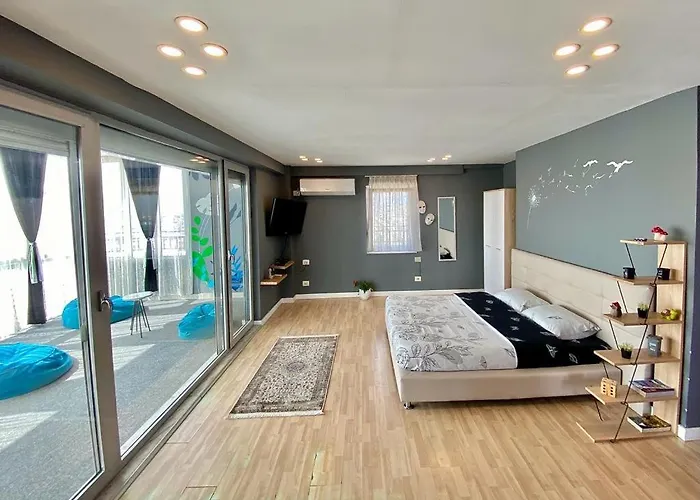 Sun-Filled Rooftop Flat In Tirana